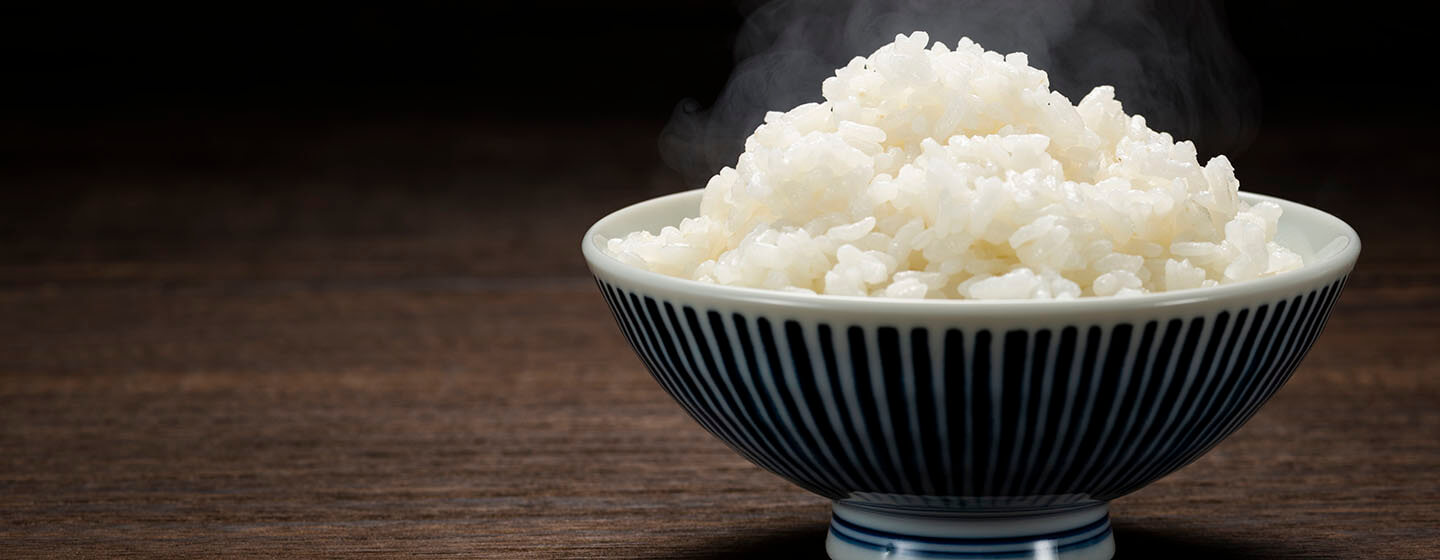 Freshly cooked hot rice in bowl 