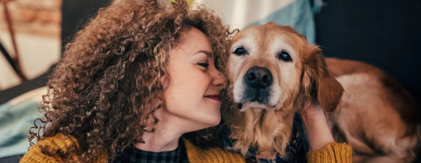 Woman with golden retriever