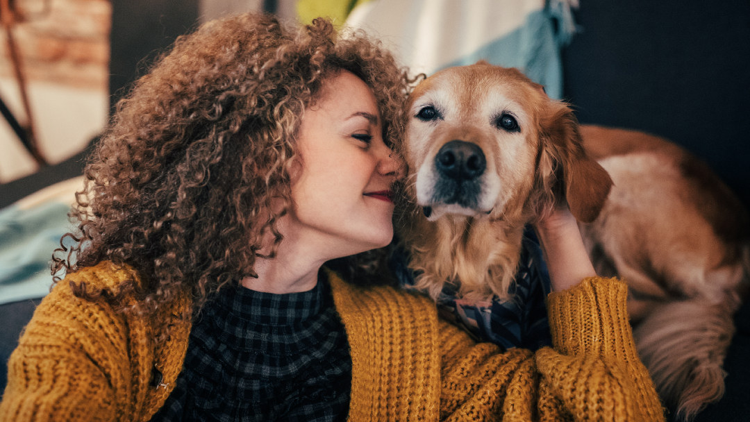 Woman with golden retriever