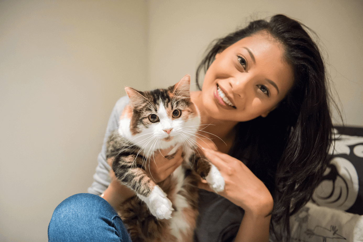 person holding a cat