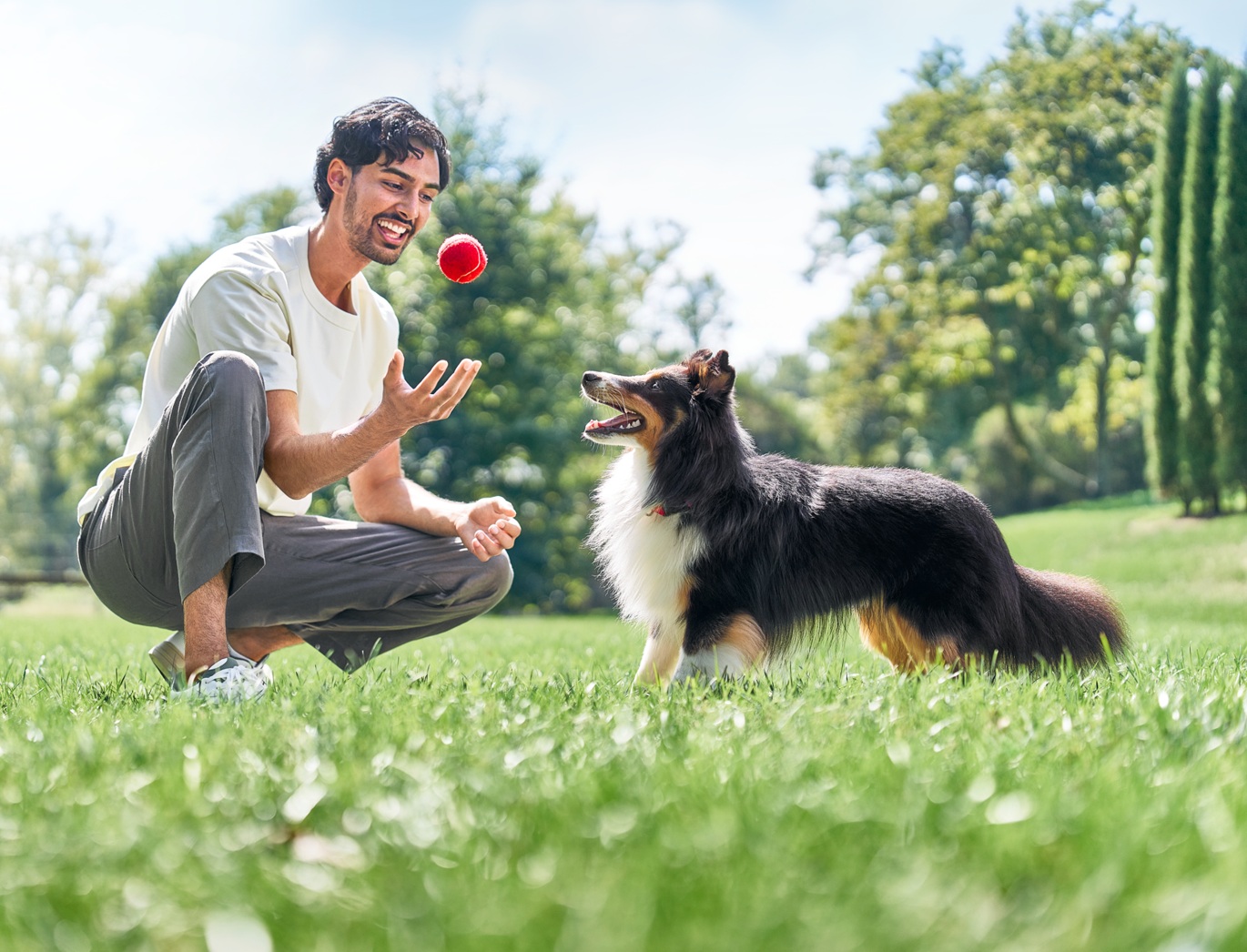 man with dog in park
